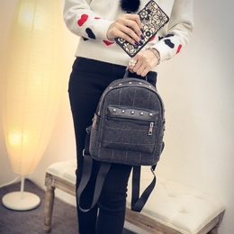 2015冬季时尚韩版学院风呢子双肩包铆钉小包包接休闲小清新双背包