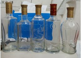 直销透明500毫升白酒玻璃瓶陶瓷酒瓶密封空酒瓶一斤装送盖子新款